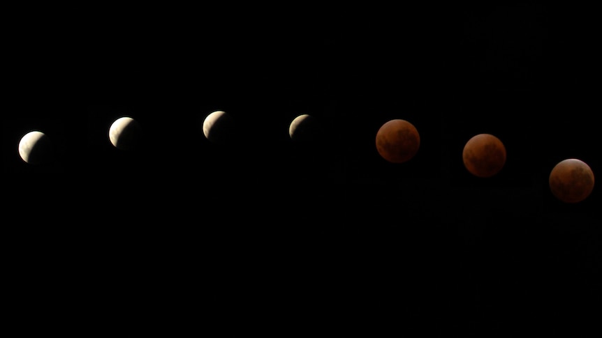 Composite: A rare lunar eclipse travels through the sky above Stradbroke Island.