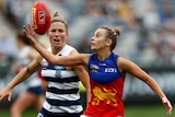 Brisbane's Gabby Collingwood gathers the ball in front of Geelong's Melissa Hickey during AFLW match