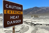 A view of sign board warning of extreme heat in Death Valley, California