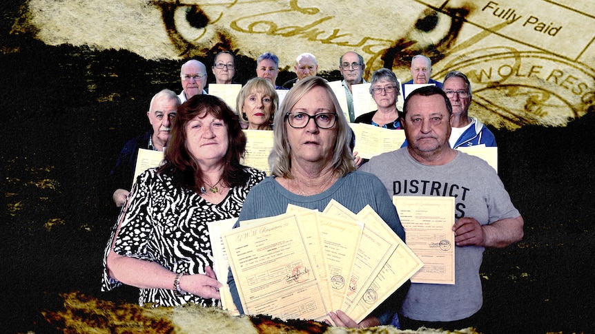 14 people arranged holding certificates. Behind them is a graphic of a wolf's eyes superimposed over torn paper with a signature