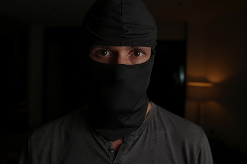 Man wearing a balaclava. 