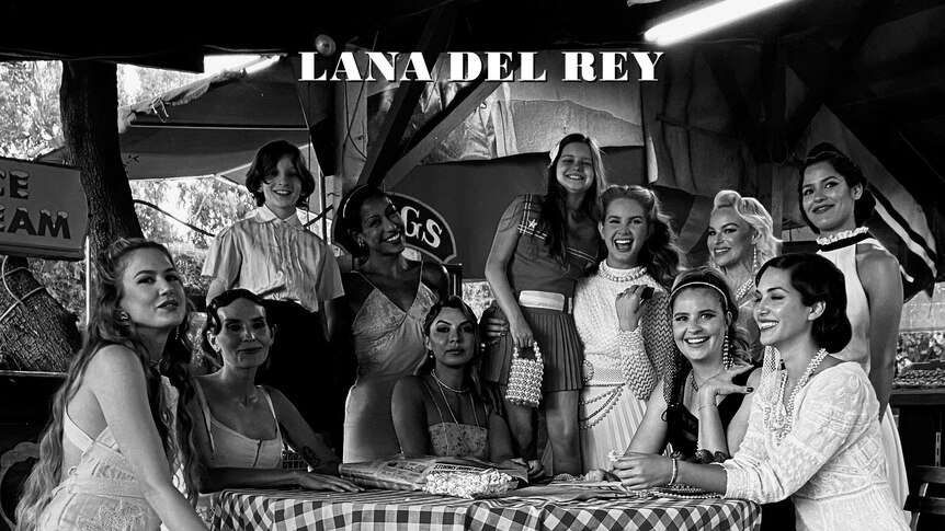 Black and white photograph of Lana and women sitting at a diners table.