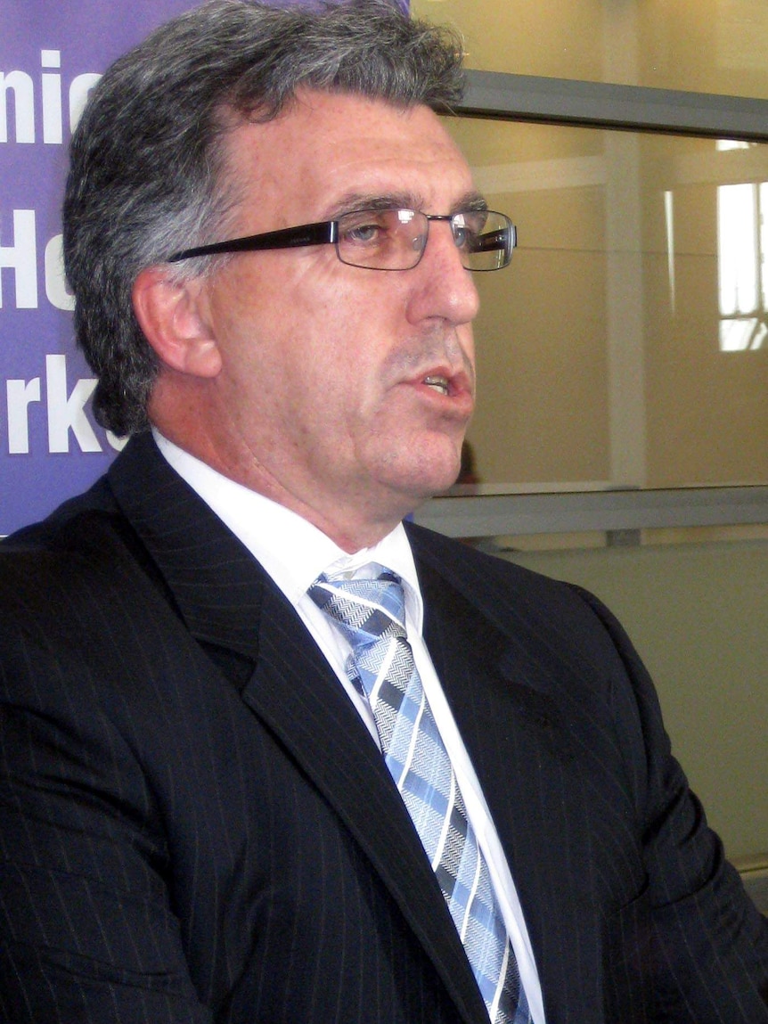 Gerard Hayes makes an announcement at the NSW branch headquarters in Sydney.