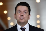 Nick Xenophon stares at the camera