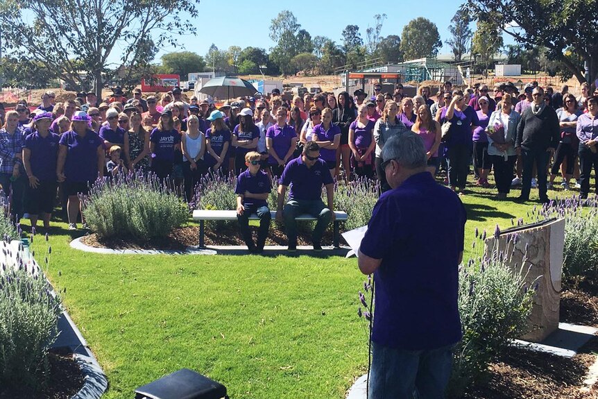 Denis Morrissey address the crowd at the Jayde Kendall memorial in Gatton