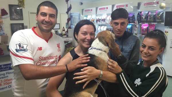 Anna Meares with Bruce the beagle and his rescuers