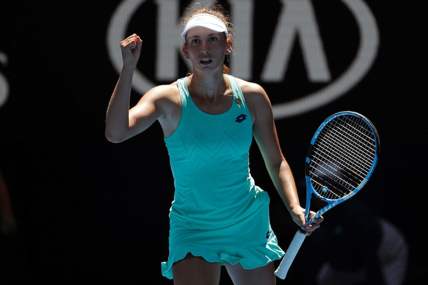 Elise Mertens pumps her fist during her match against Elina Svitolina at the Australian Open.