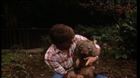 Presenter Don Spencer holds a wombat