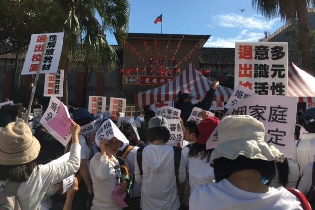 Anti same-sex marriage advocates rally in Taiwan ahead of a vote in the island's parliament