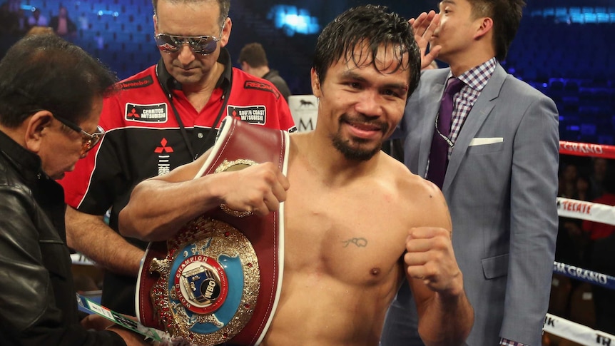 Manny Pacquiao celebrates his victory over Timothy Bradley in Las Vegas on April 12, 2014.