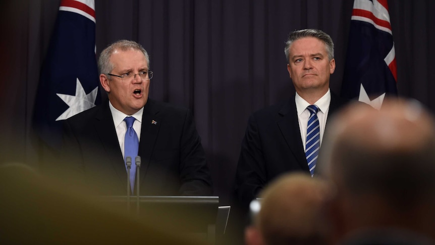 Treasurer Scott Morrison and Finance Minister Mathias Cormann speak to the media.