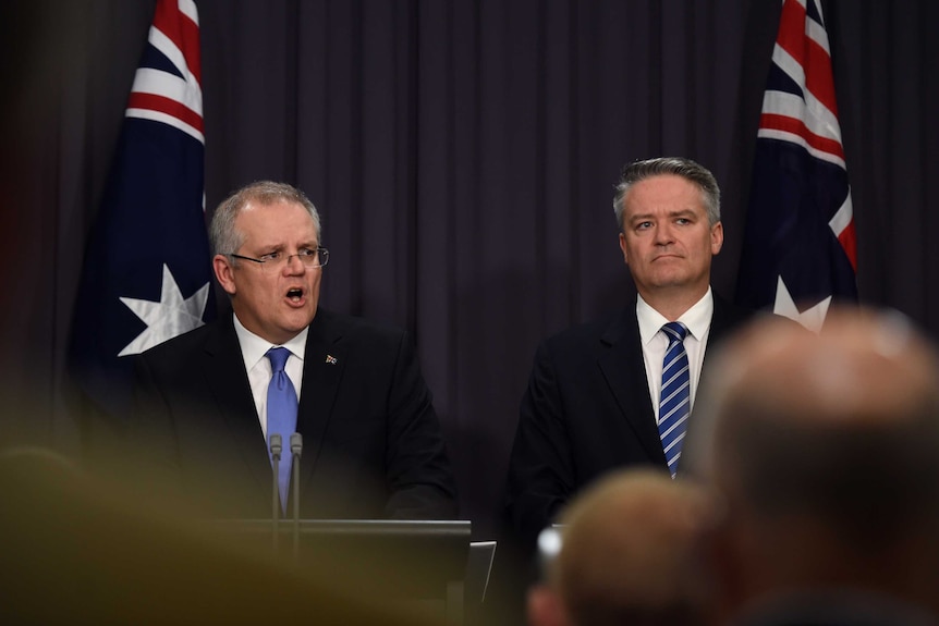 Treasurer Scott Morrison and Finance Minister Mathias Cormann speak to the media.