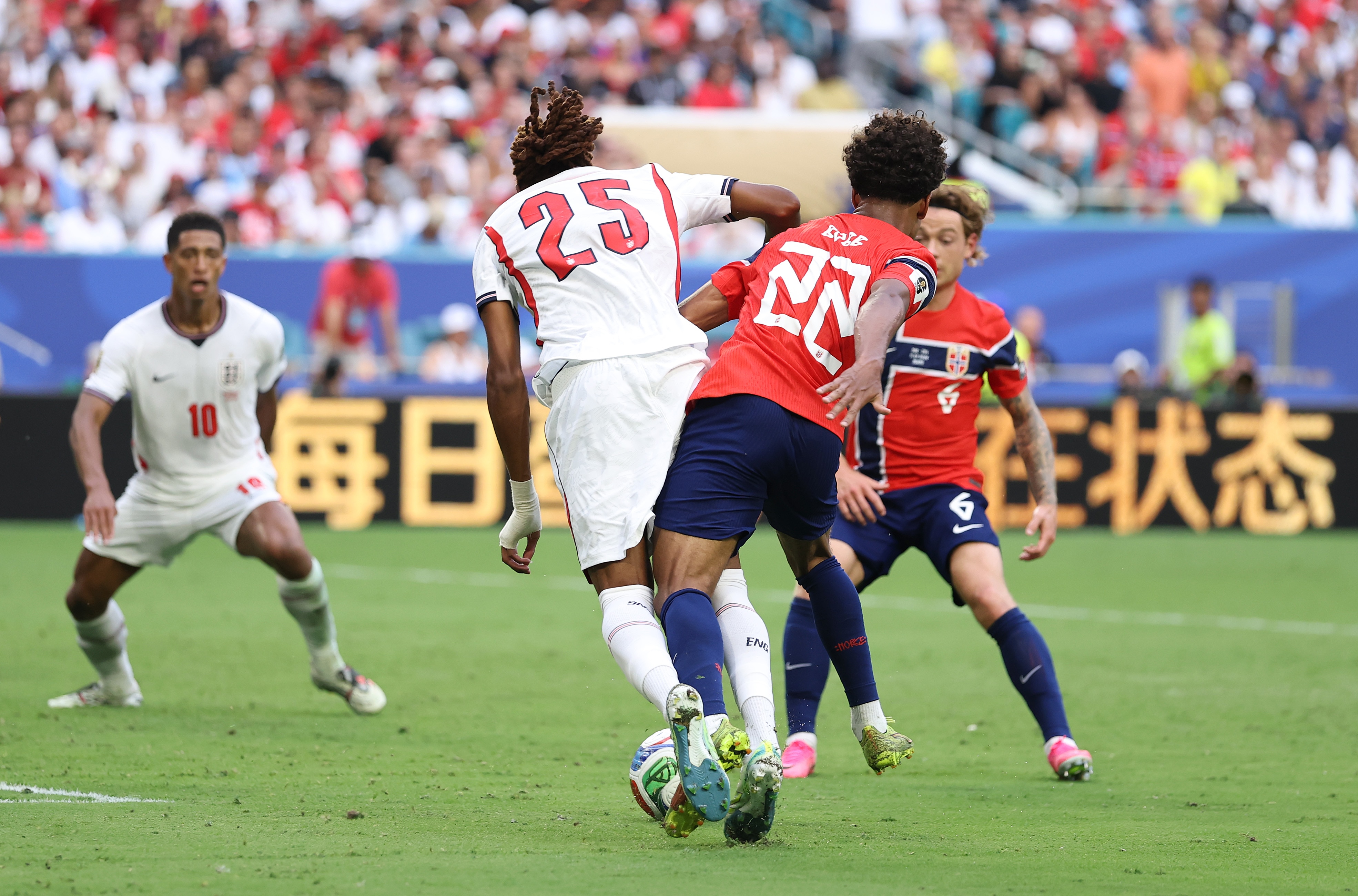 Djed Spence is fouled by Oscar Bobb