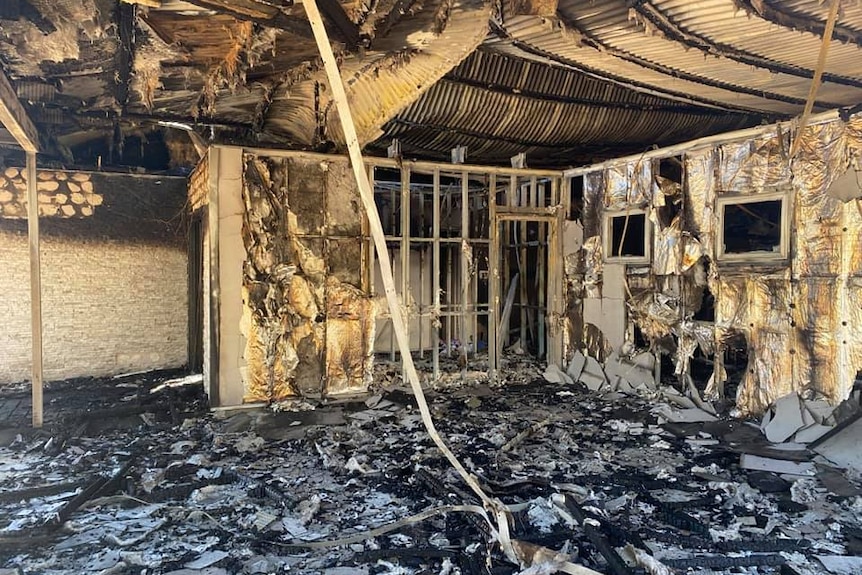The burnt inside of a house.