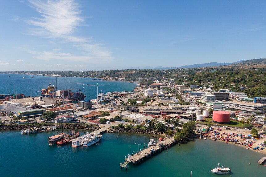 Aerial shot of Solomon Islands showing buildings and the port.