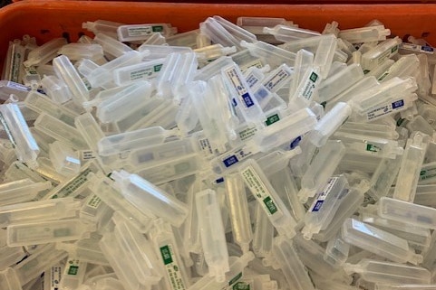 A basket of syringe caps at St Vincent's hospital in Sydney.