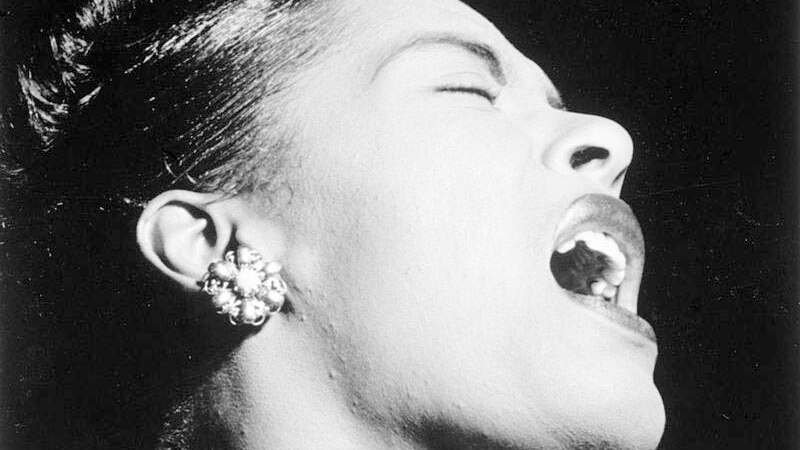 Billie Holiday at the Downbeat club — a jazz club in New York City.