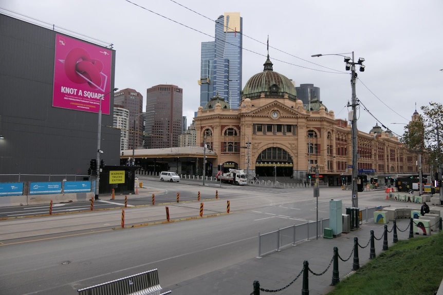 The intersection outside Flinders Street Station with no cars around.