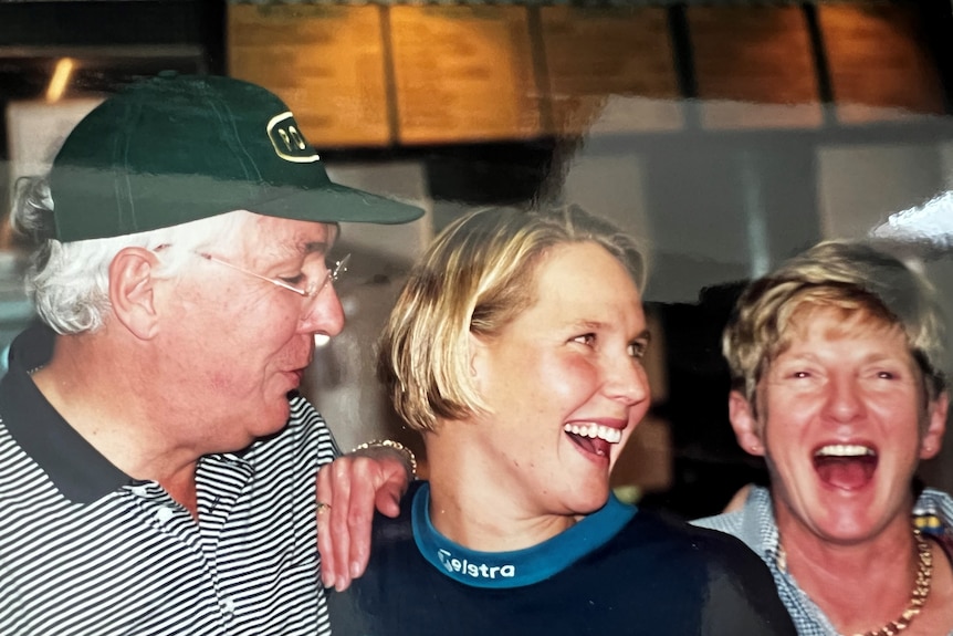 close up head shot of Susie O'Neill with her parents