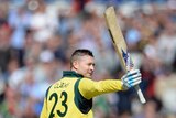 On song ... Michael Clarke celebrates his century at Old Trafford