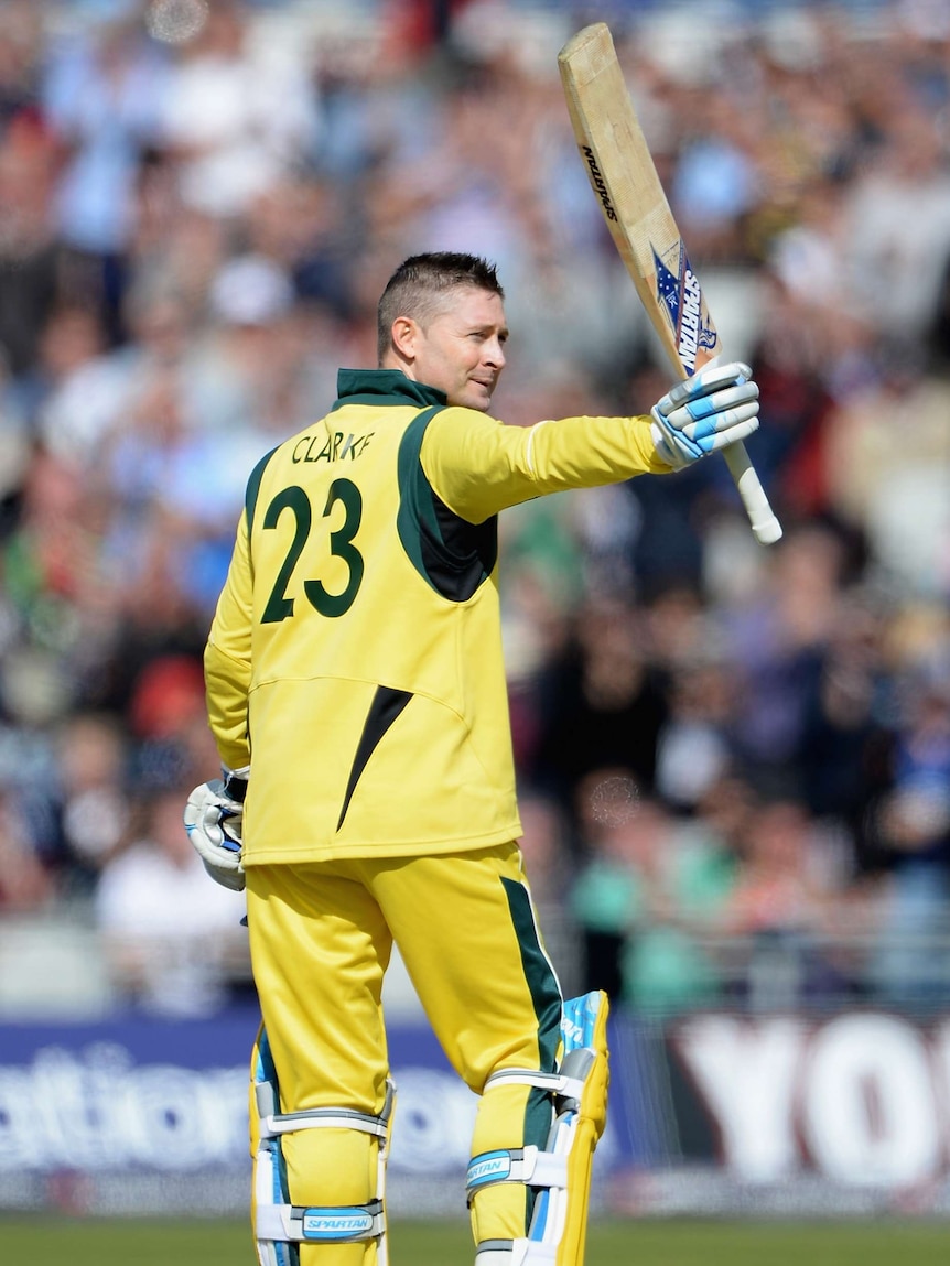 On song ... Michael Clarke celebrates his century at Old Trafford