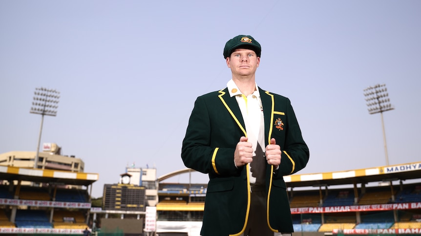 Steve Smith looks at the camera at India's Holkar Stadium while wearing the Australian Test captain's blazer.