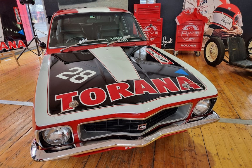 A black, white and red motor sport car