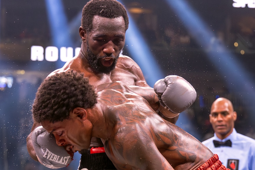 Terence Crawford punches Errol Spence Jr