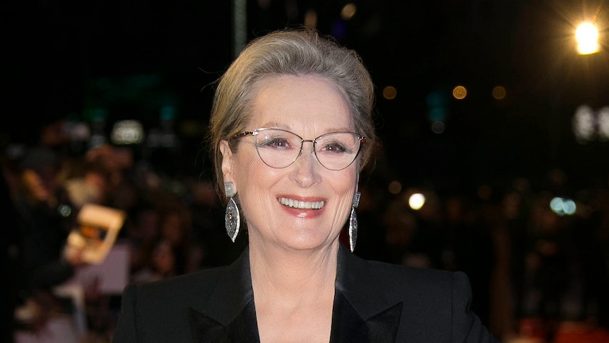 A close up of Meryl Streep smiling.