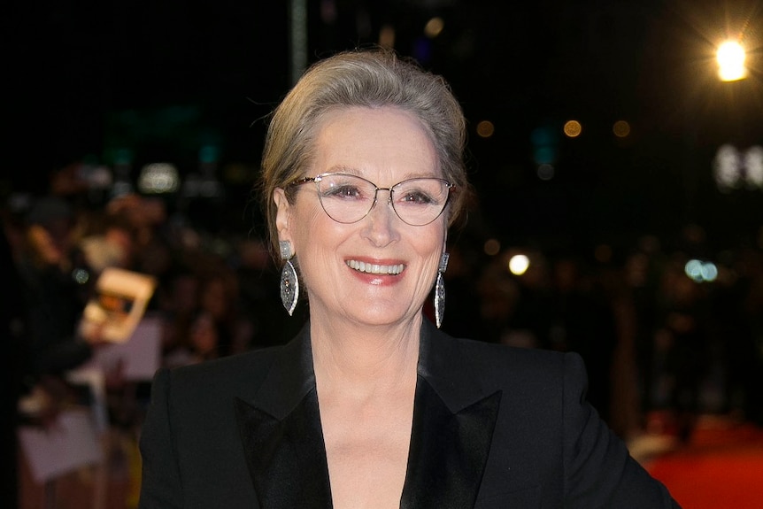 A close up of Meryl Streep smiling.
