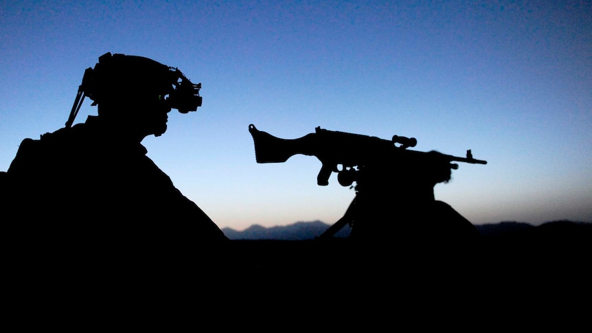 An Australian SAS trooper provides security in Afghanistan