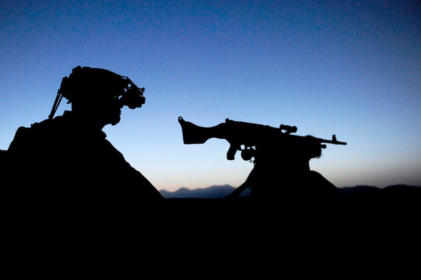 An Australian SAS trooper provides security in Afghanistan