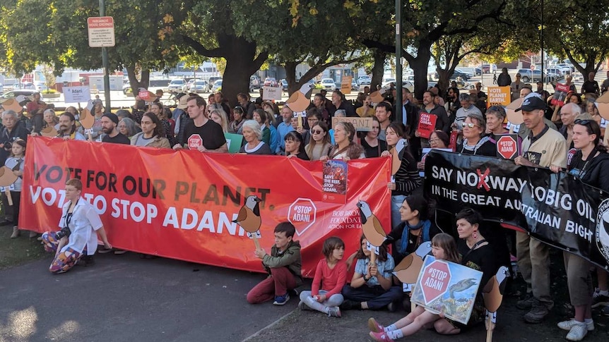 Protesters gather before setting off on the Stop Adani Convoy, Hobart, April 17, 2019.