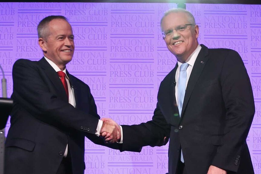 Scott Morrison and Bill Shorten shake hands ahead of the final leaders' debate.