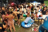 Rescue workers tend to injured people at an amusement park in Taiwan after an explosion