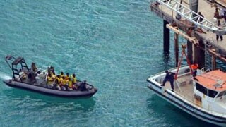 340 x 180 crop of asylum seekers in boat