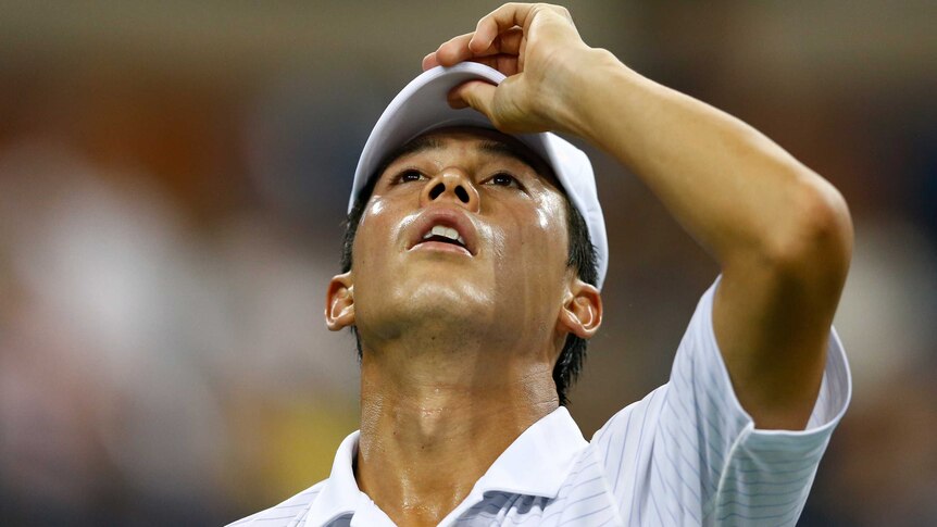 Kei Nishikori during his clash with Milos Raonic