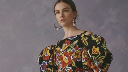 A black garment with a floral pattern from Carolina Herrera's Resort 2020 collection.