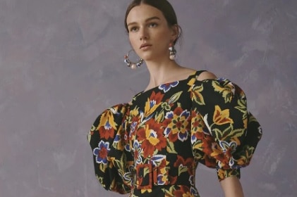 A black garment with a floral pattern from Carolina Herrera's Resort 2020 collection.