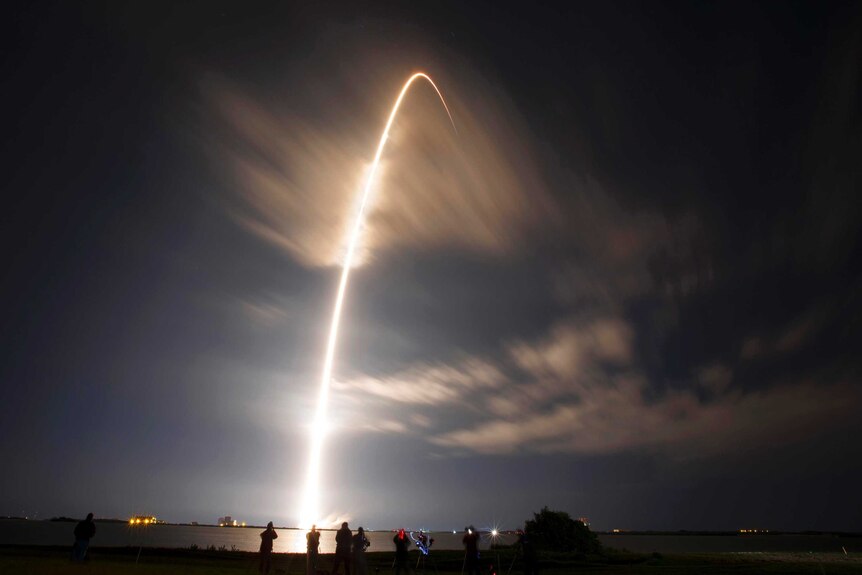 The unmanned Falcon 9 rocket launches from Cape Canaveral