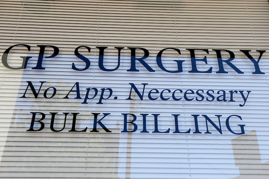 A doctor's surgery front door sign, reading "GP Surgery. No app. necessary. Bulk billing"