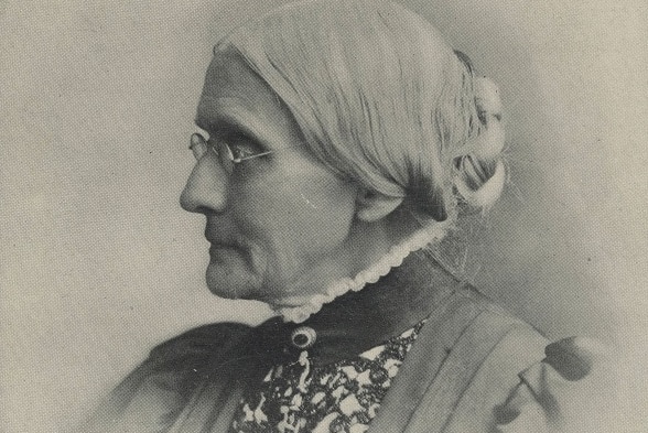 A black and white photograph from the early 1900s of Susan B Anthony.