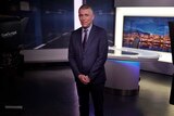 ABC Tasmania weather presenter Simon McCulloch on the news set.
