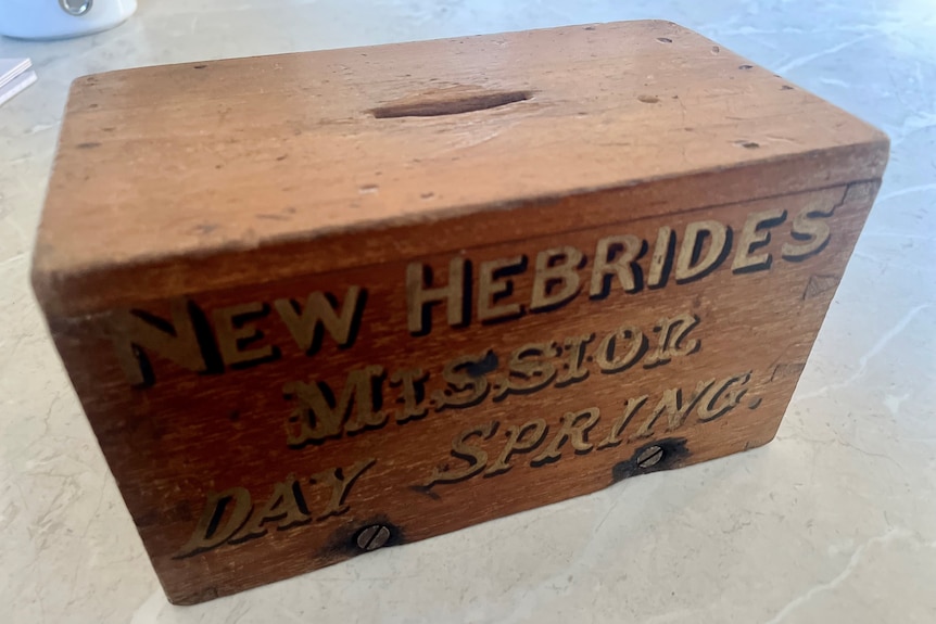 old antique wooden money box