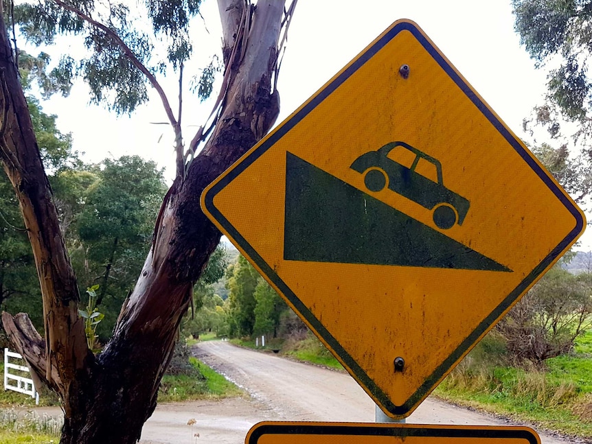 Downhill sign, rural Victoria