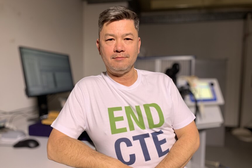 Alan Pearce wears a shirt that says "end CTE"