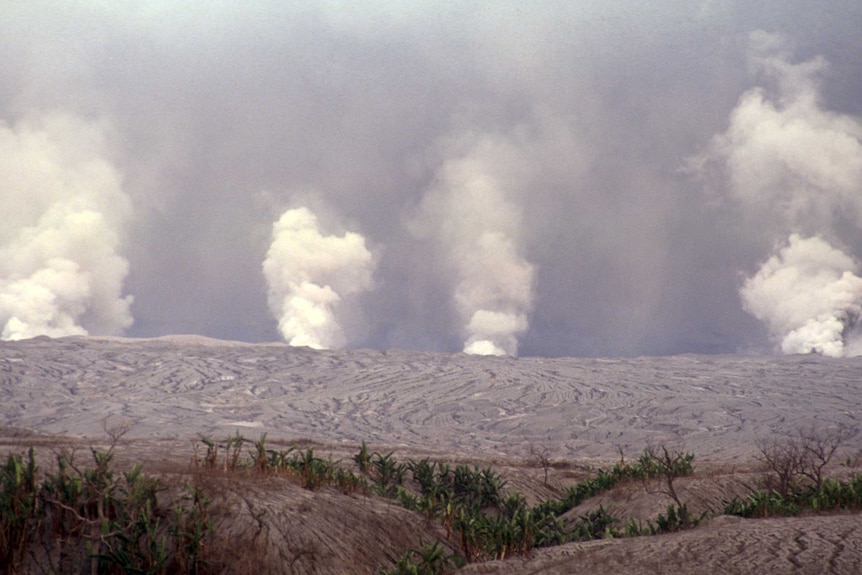 Smoke and ash rises from the Mt Pinatubo volcano.