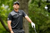 Jason Day watches his drive in the final round of the Masters