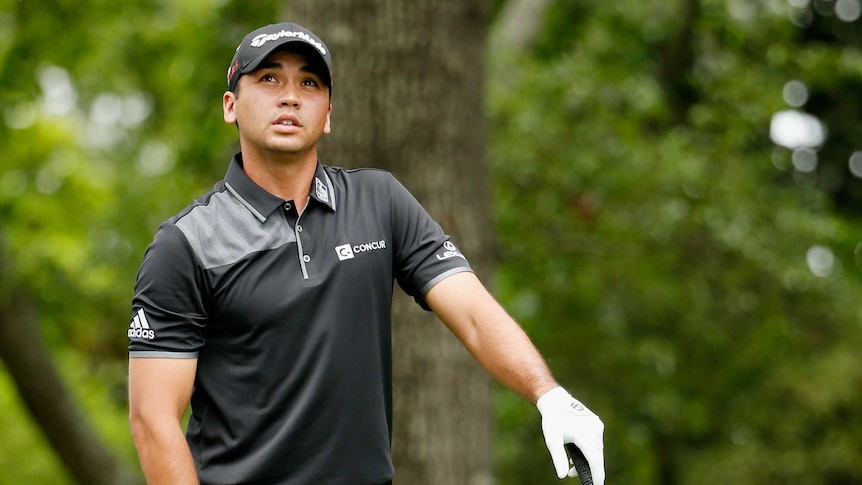Jason Day watches his drive in the final round of the Masters