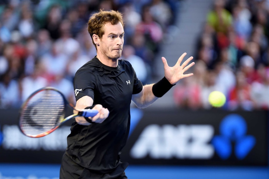 Tight tussle... Andy Murray makes a forehand return against Novak Djokovic